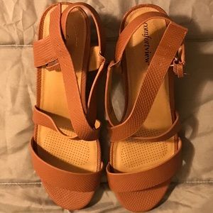 Brown, snake-like, strappy, open-toed wedge!